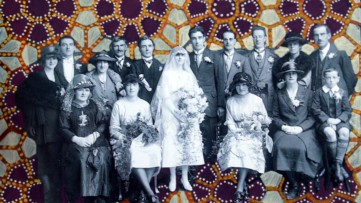 A photo collage using an old photo of a wedding party. Around the people is an African looking print.